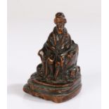 17th/18th Century carved figure, of what appears to be a gentleman in Cossack dress holding a
