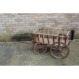 Rustic wooden wagon, with four wheels and carriage, 67cm wide