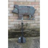Weather vane, with rotating pig above the four compass points, 66cm wide, 96cm high