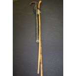 Whipping cane, bamboo walking cane with curved handle, black leather mounted truncheon, J Hudson &