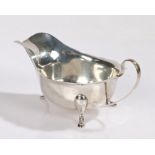 George VI silver sauceboat, Sheffield 1938, maker Emile Viner, with loop handle and wavy rim, raised