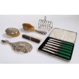 Silver and plated wares, to include silver handled hand mirror, hairbrush and clothes brush, ebony