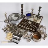 Silver plated wares, to include cutlery (some boxed), pair of candlesticks, two swing handled