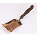 19th Century copper shovel, the wooden handle carved in relief with flowers, approx. 32cm long