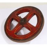 19th Century barrow wheel, painted in red and yellow, 31cm diameter