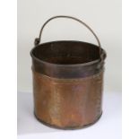 Late Victorian copper coal bin, having swing handle and stud work rivets, 33cm diameter x 31cm high