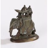 Indian cast metal elephant, mounted with a figure and howdah, 8cm tall