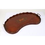 Victorian mahogany tray, of kidney form, with wavy rim and brass carrying handles, the central field