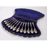 Set of twelve Edward VII silver teaspoons, London 1907, maker Charles Boyton & Son Ltd, with foliate