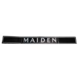 Modern enamel sign 'Maiden', with white lettering on a black ground, 228cm long x 23cm high