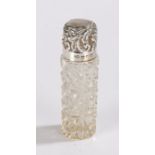 Late Victorian silver topped scent bottle, date letter rubbed, having silver screw top with