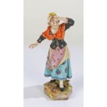 Fursternberg porcelain figure, of a lady holding her hand to her head, the other by her side, the