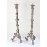 Pair of silvered wooden floor standing pricket sticks, each with knopped columns and raised on three