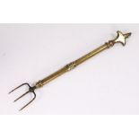19th Century brass telescopic toasting fork, with an iron three pronged end, 79cm when fully
