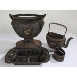 Three items of 19th Century toleware, to include a pedestal pot with swing handle, a teapot and an