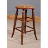 19th Century oak stool, he circular seat above ring turned legs, 28cm wide, 54cm high