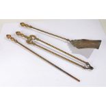 Brass three piece companion set, consisting of shovel, tongs and poker, the shovel with gadrooned