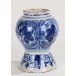 18th Century Dutch Delft jar, with flower head design, 15cm high