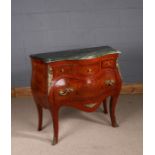 French walnut commode, 20th Century, of bombe form, the shaped green marble top above three small