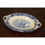 Wedgwood Ferrara pattern oval twin handled dish, blue and white transfer decorated with ships in a
