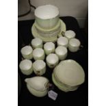 Victorian porcelain part coffee service, in lime green to white with coffee cups and saucers, a