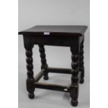 17th Century style oak joint stool, the rectangular top above turned legs, 42cm long, 28cm wide,