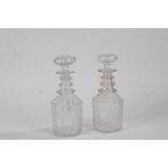 Pair of 19th Century decanters, the stoppers above the mallet body, 22cm high, (2)