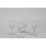 Set of four 19th Century wine glasses, with tapering thumb cut bodies above ring stems and a wide