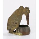 Early 20th Century novelty cigar cutter, of a stork looking over a bowl, the beak moving to form the