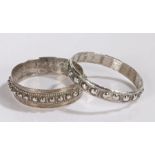 Two Indian white metal bangles, gross weight 120.5g