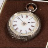 Silver pocket watch, white face with roman numerals, the case has a floral design