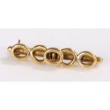 18 Carat Gold pin brooch, decorated with five loops, gross weight 10.5g