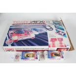 Boxed Tomy AFX Midnight Marathon slot car racing set, including two additional boxed cars (3)