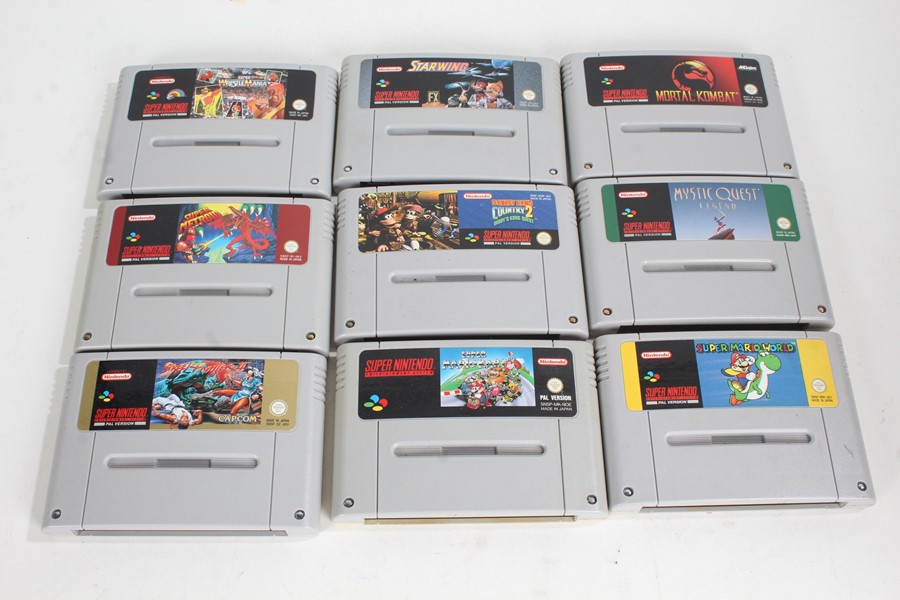 Collection of Super Nintendo SNES game cartridges, to include Mortal Kombat, Super Metroid, Donkey