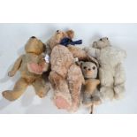 Three teddy bears and a stuffed toy mouse, (3)