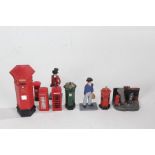 Collection of miniature post boxes and three figures on stands, one Dinky Toys and Stevelyn example,