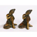 Two small Indian bronzed figures, both modelled in a seated position, 6cm high (2)