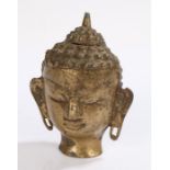 Indian brass buddha's head, 12cm high