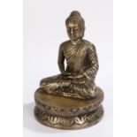 20th Century brass Indian buddha, modelled in a seated position with crossed legs, 16.5cm high