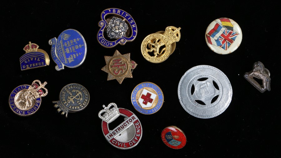 Various lapel badges including, Civil Defence Corps, Civil Defence Instructor, National Fire