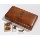 Wooden box with the badge of the Royal Corps of Signals (Kings Crown) carved into the lid,