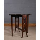 Arts and Crafts oak sutherland table, the shaped top with fret carved side panels and raised on