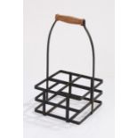 20th Century wrought iron bottle carrier, with turned wooden handle and four divisions, 39cm high