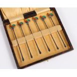 Set of six 1920's silver and enamel cocktail sticks, Birmingham 1928, each having coloured enamel