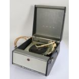 Bush table top record player, by Garrard, housed within a navy carrying case