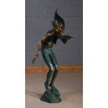 Large floor standing bronzed elf, modelled in a standing position holding a leaf, 130cm high