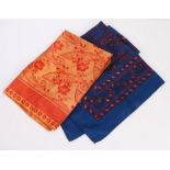 Ladies Paisley head scarf, in red on a blue ground, 67cm x 65cm approx., together with one other
