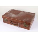 Trunk Department brown leather suitcase, the underside lid with makers label 'By Special Appointment