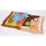 Two brightly coloured silk scarves, the first one printed with yellow, green, pink and brown flowers