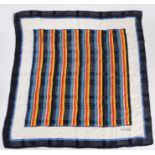 Erre silk scarf, centred with lines with of bright colours within a white and navy border, signed to